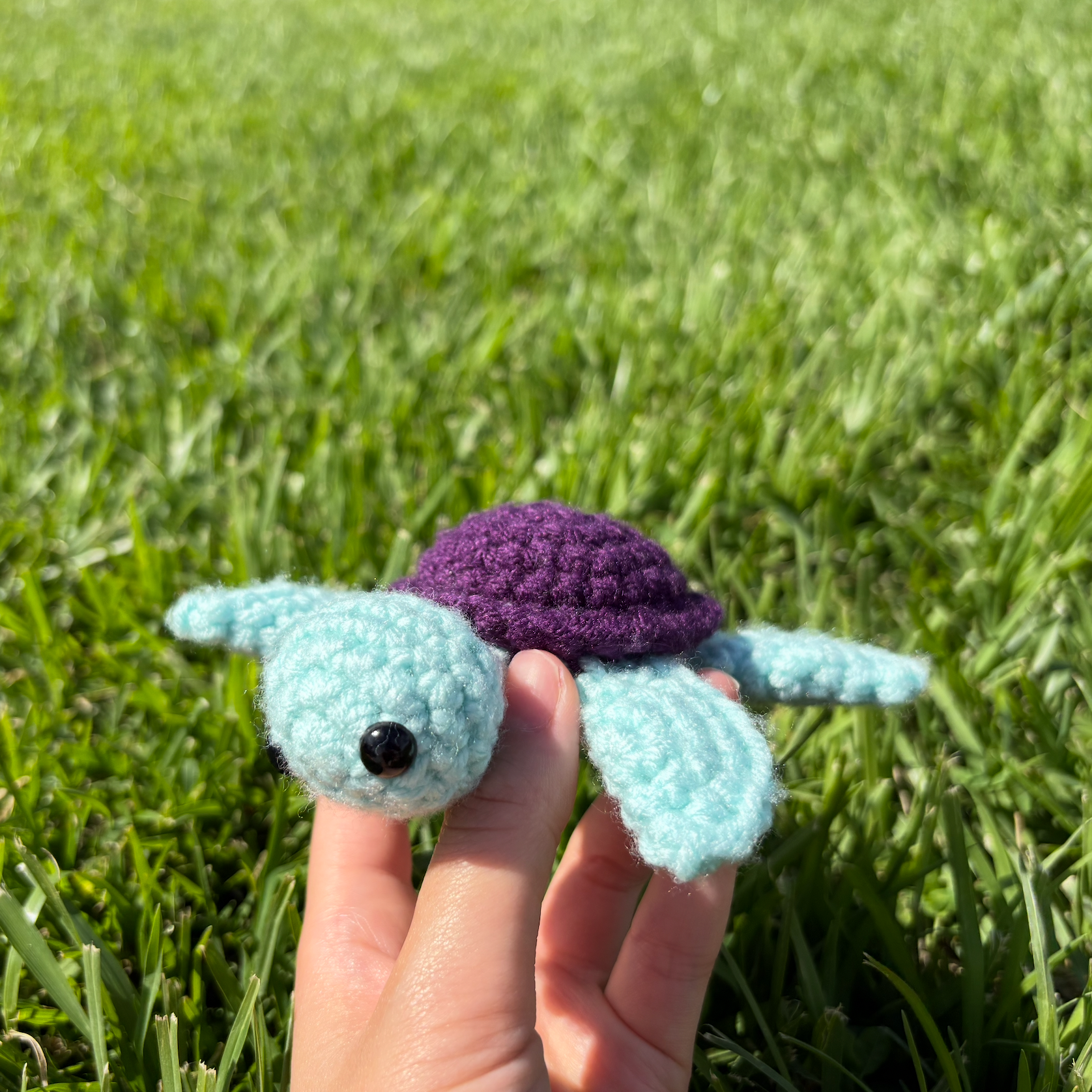 a small crocheted sea turtle 
